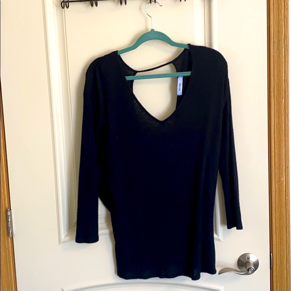 Open back light sweater